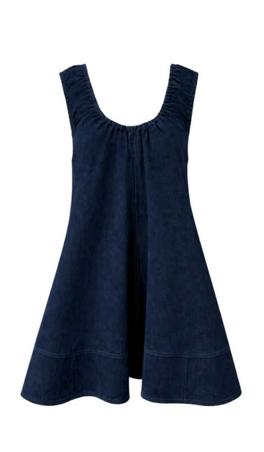 Sleeveless indigo denim mini dress featuring a loose flowy silhouette, high straight neckline at the back and soft lightweight denim fabric. Style with cowboy boots for ultimate country girl look.