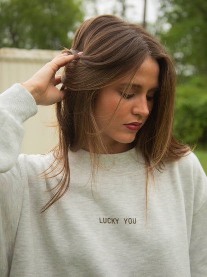 Relaxed fit ash grey crewneck jumper with mock neck collar and western art design