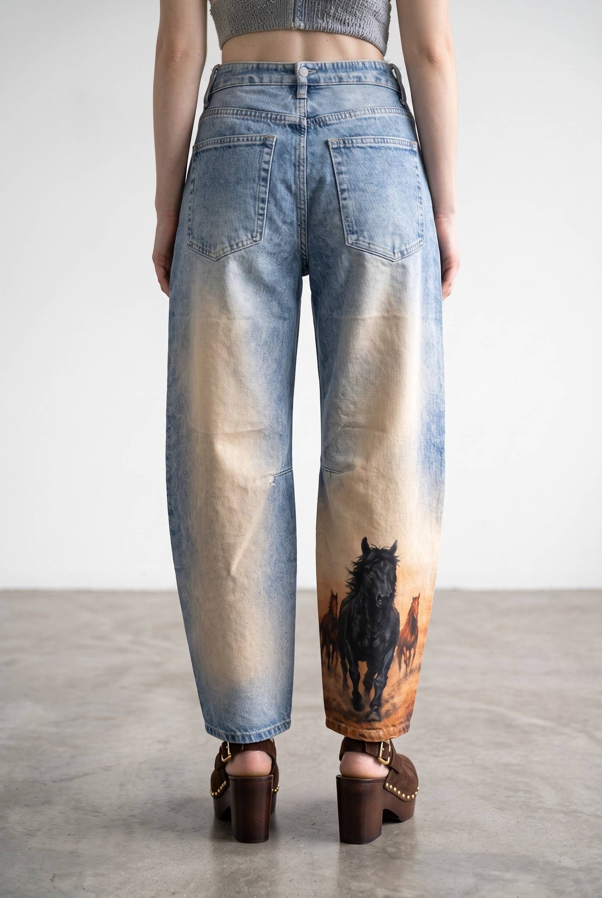 Women's vintage wash barrel leg horse print jeans