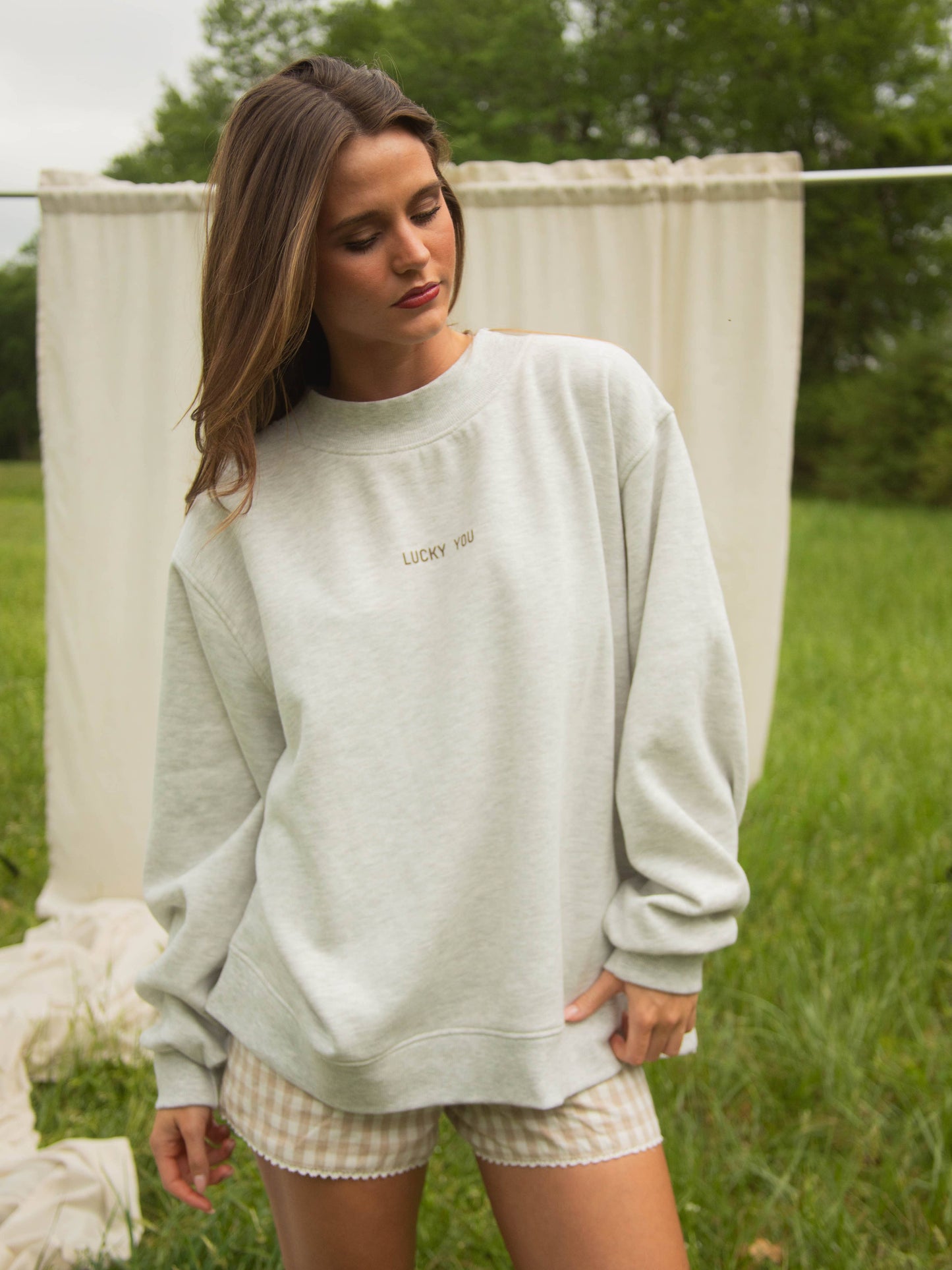 Women's oversized western sweatshirt with Lucky You chest print and cowboy graphic