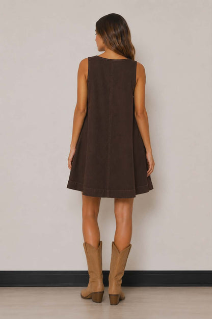 Relaxed fit brown western dress with a flattering flowy shape, subtle seam detailing and sleeveless design. The perfect throw-on piece for rodeos, festivals and casual country outfits