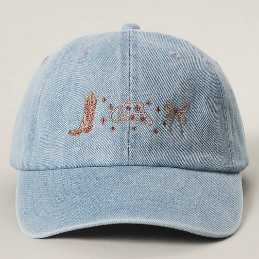Light denim western cap featuring embroidered cowboy boots, cowboy hat and bow detailing
