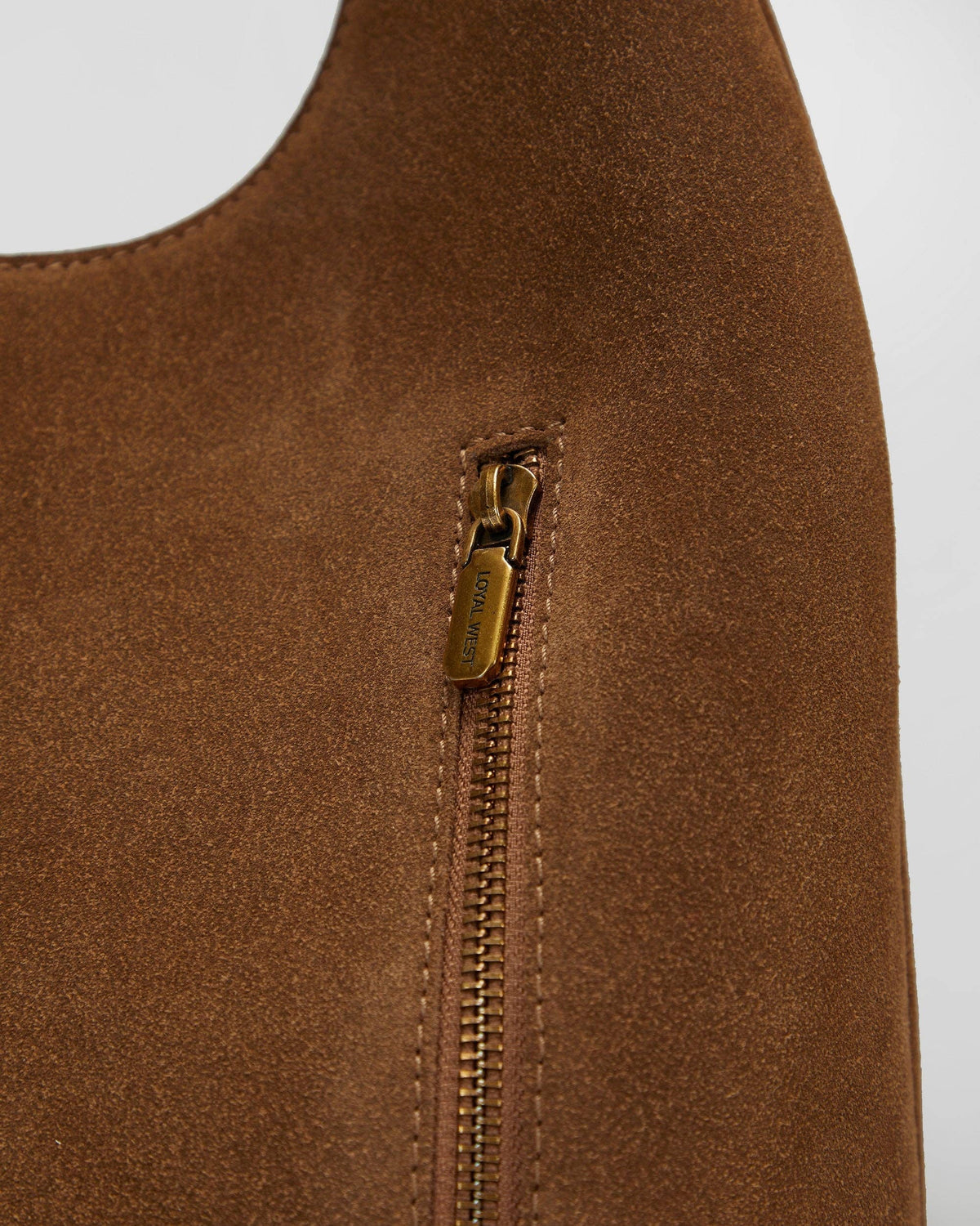 Western suede leather handbag with signature LW gold emblem