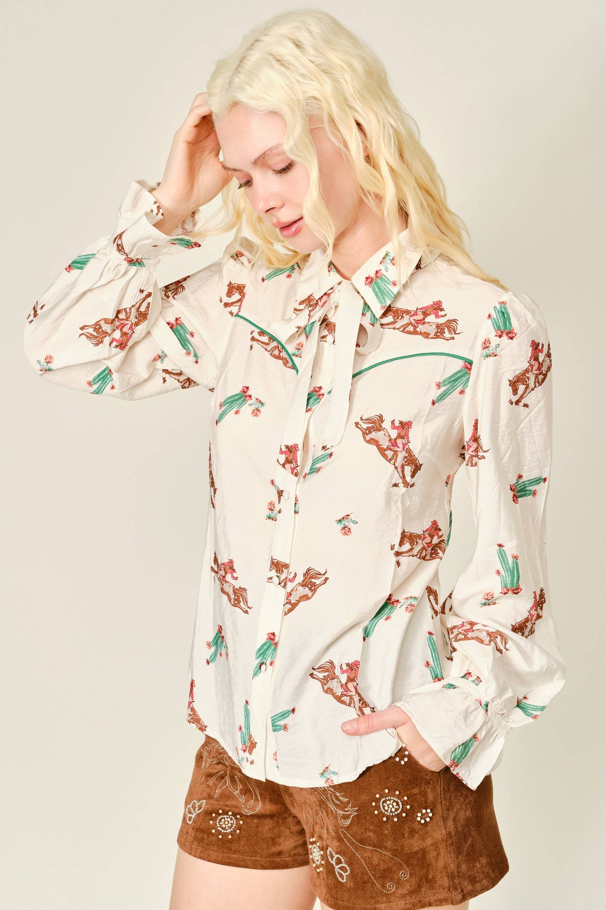 Cream rodeo print western shirt with cowboy and cactus print