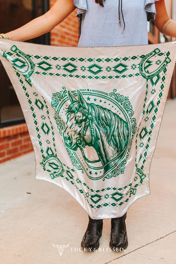 Emerald green horse print wild rag with western horseshoe border and geometric detailing on cream silky fabric