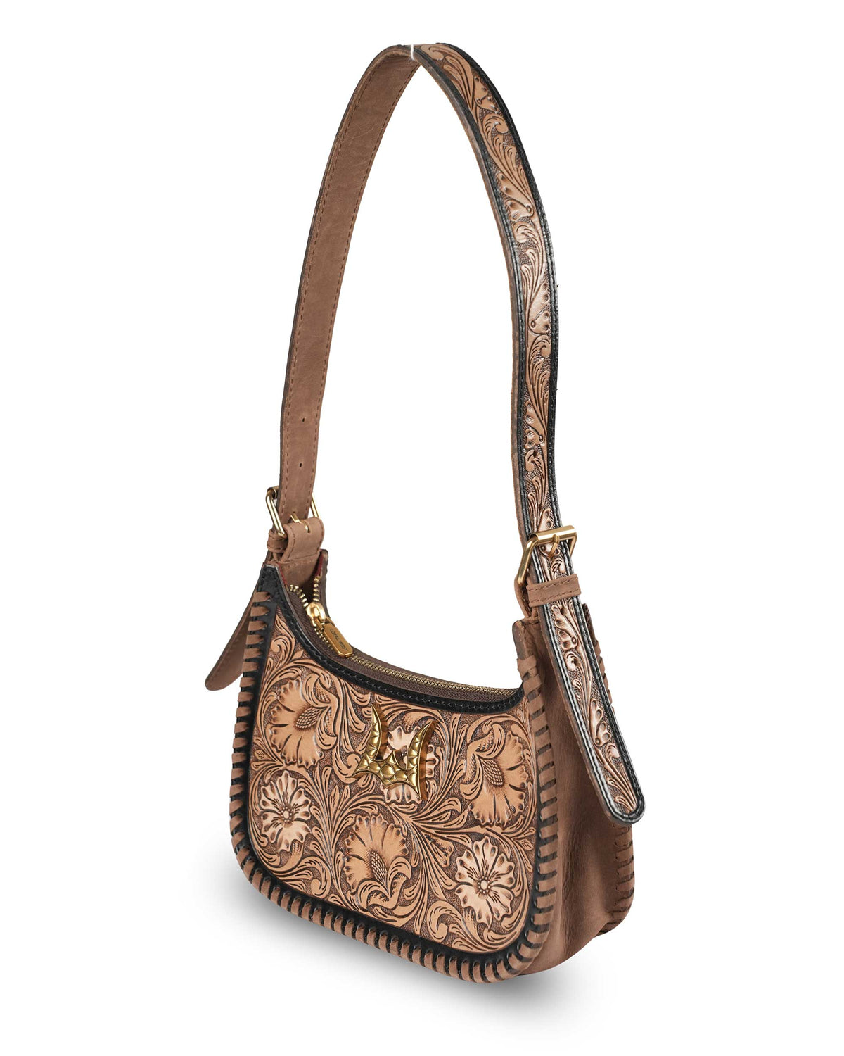 side view of tan western shoulder bag featuring intricate floral detailing and adjustable buckle strap