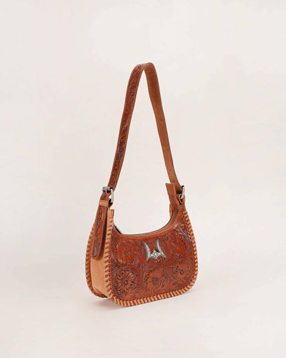 Dannia Medium Purse styled with black clothing showing tan leather western shoulder bag