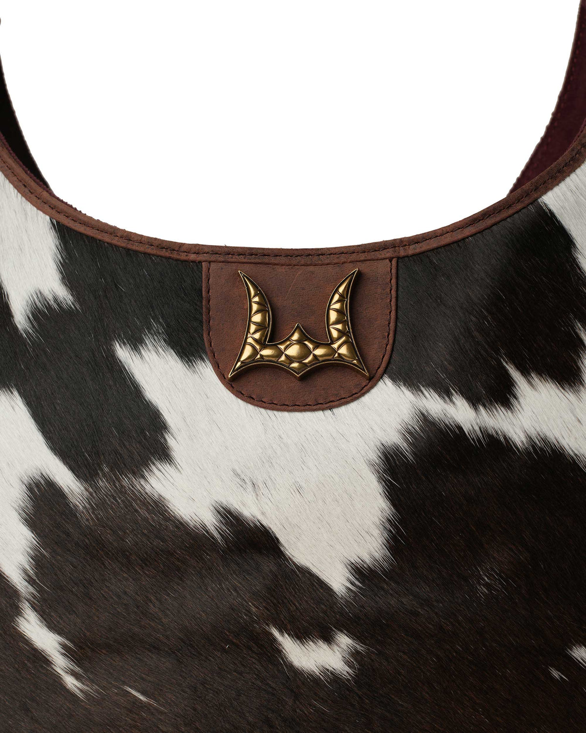 Loyal West cowhide western bag with velvet lined interior and internal storage pockets