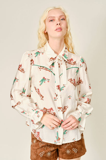 Cream western cowgirl blouse with tie neck and cactus print