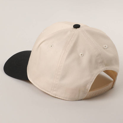 Adjustable western baseball cap in cream and black with premium embroidered front