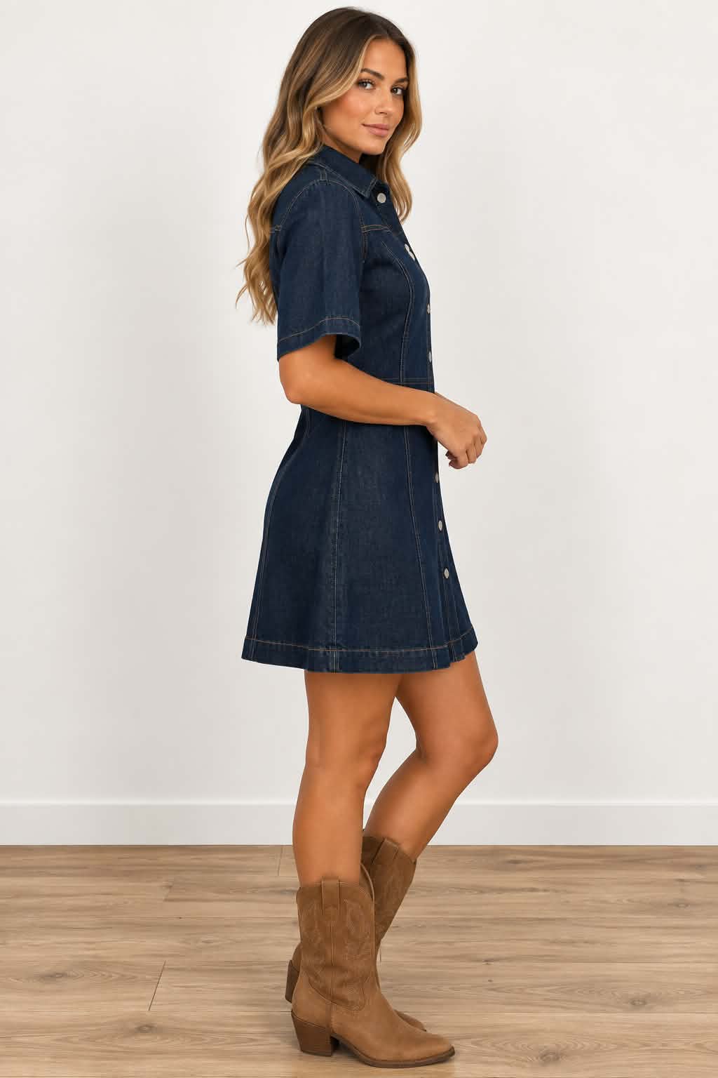 Side view of Cheyenne dark denim dress with fitted waist, flared skirt and western stitching