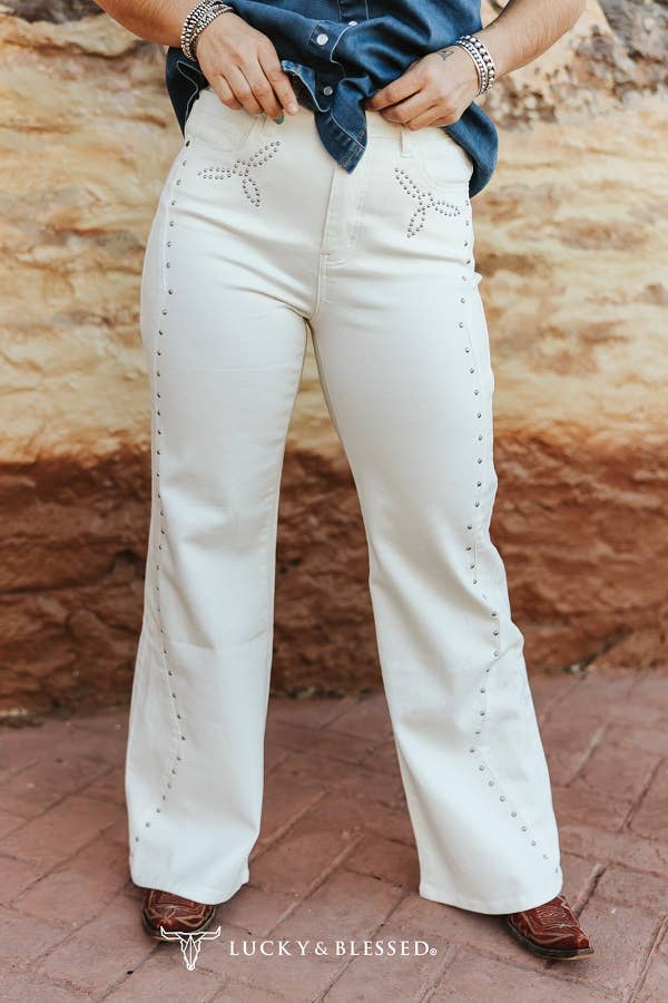 Women'[s ivory western bootcut jeans with silver stud detailing