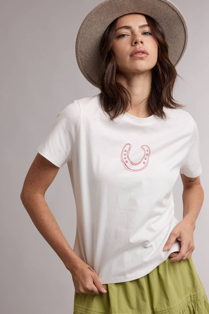 White women's western graphic tee with red horseshoe design