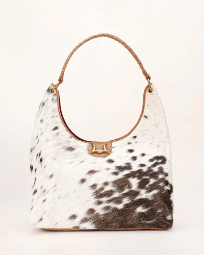 Western cowgirl leather shoulder bag in natural cowhide