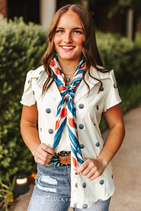 Western silk scarf with rearing horses, geometric details and vibrant turquoise and orange colours