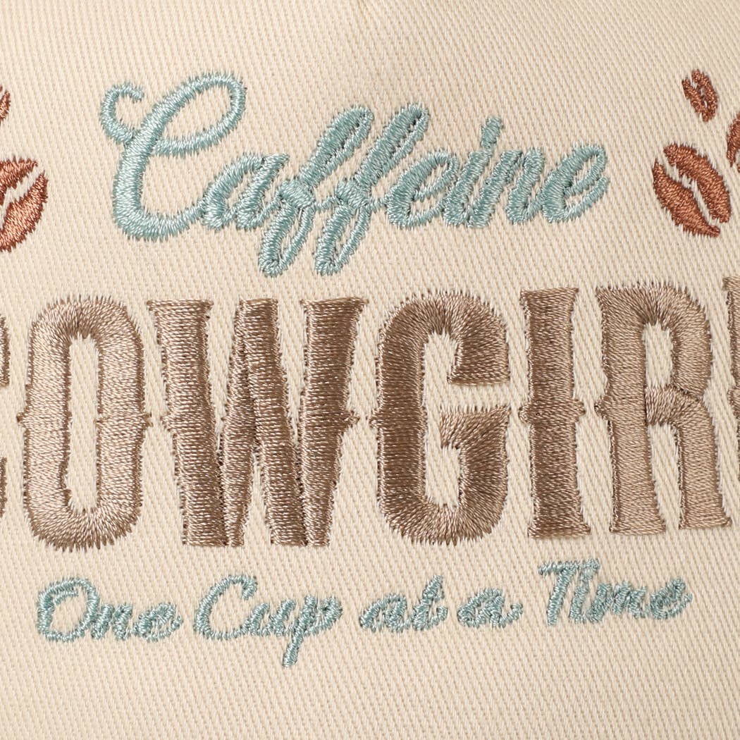 Women's western trucker cap featuring Caffeine Cowgirl embroidery and adjustable snapback