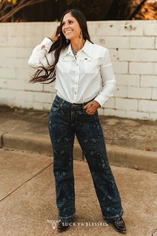 Cowgirl statement jeans with western, rodeo print, dark denim wash and boot friendly straight leg