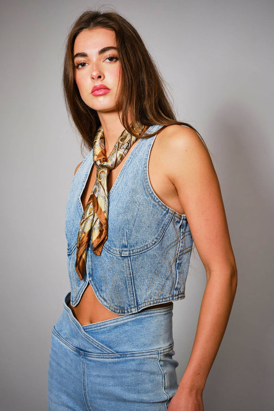 Women's light wash denim vest with plunge neckline