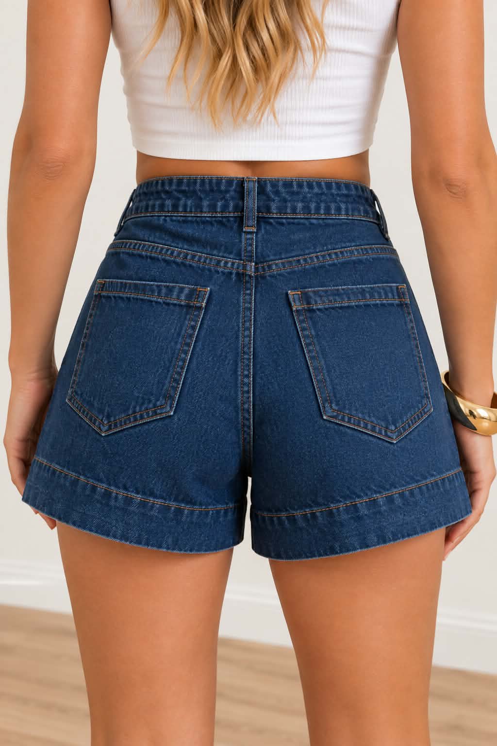 Women's high waisted denim shorts back view with functional pockets