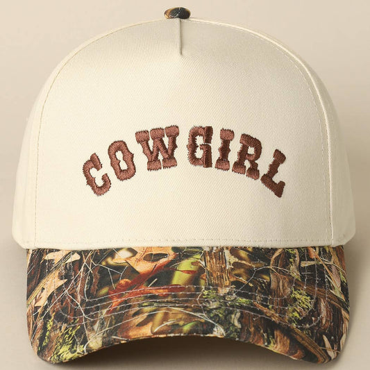 Cream Cowgirl trucker cap with brown embroidery and Realtree camo brim