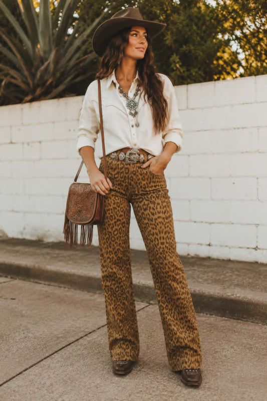 Women's leopard print western jeans featuring a flattering high-rise fit, straight leg silhouette, and bold cowgirl inspired styling