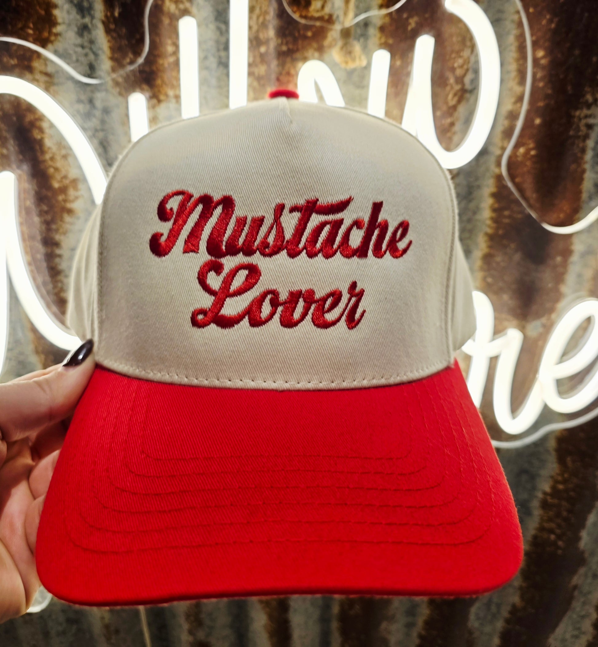 Mustache Lover trucker cap with red embroidery and red brim