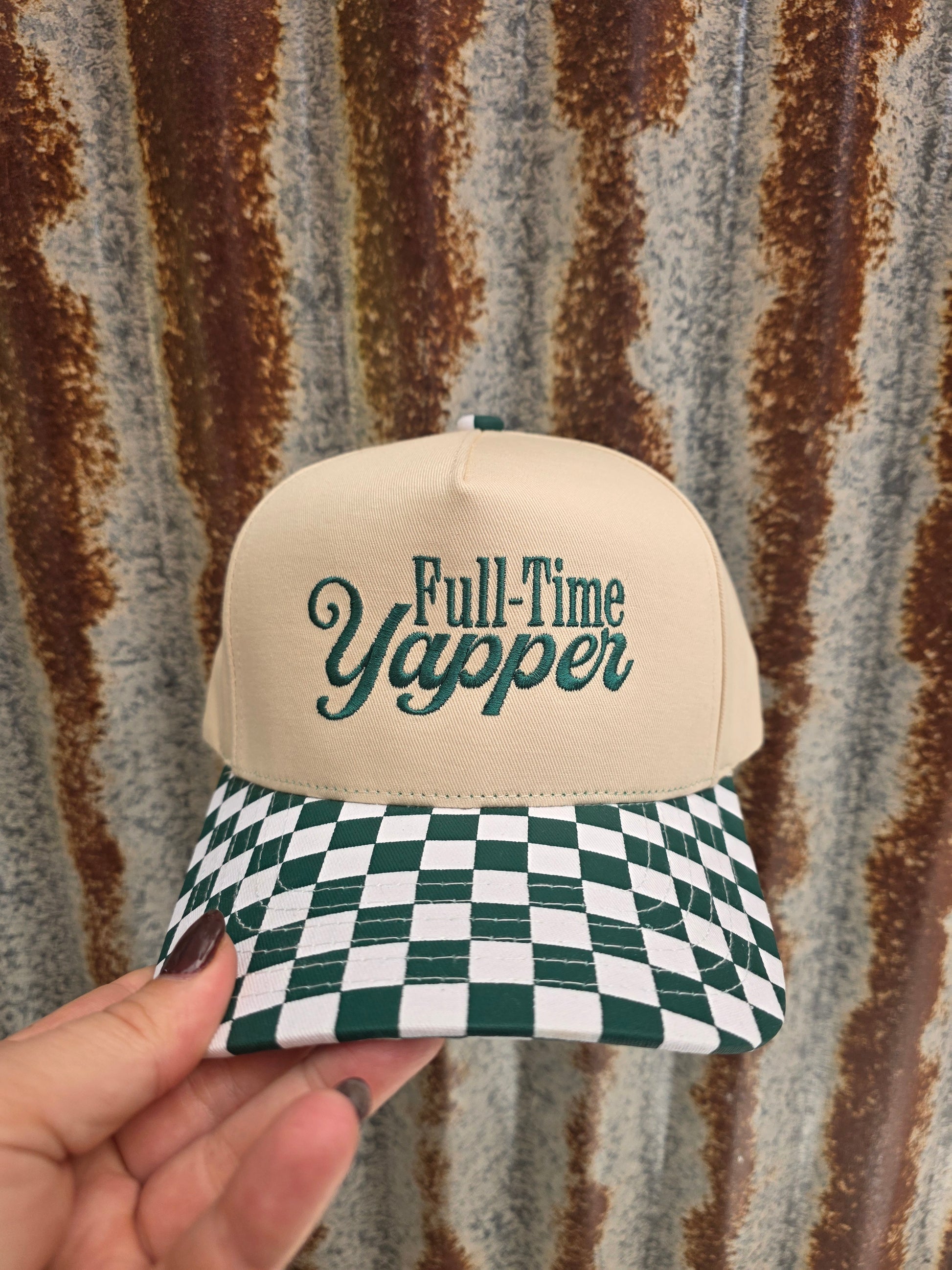 Westen inspired trucker cap featuring a cream crown, dark green saying "Full Time Yapper"