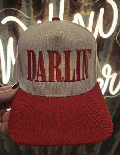 Darlin' corduroy trucker cap with red embroidery and red brim