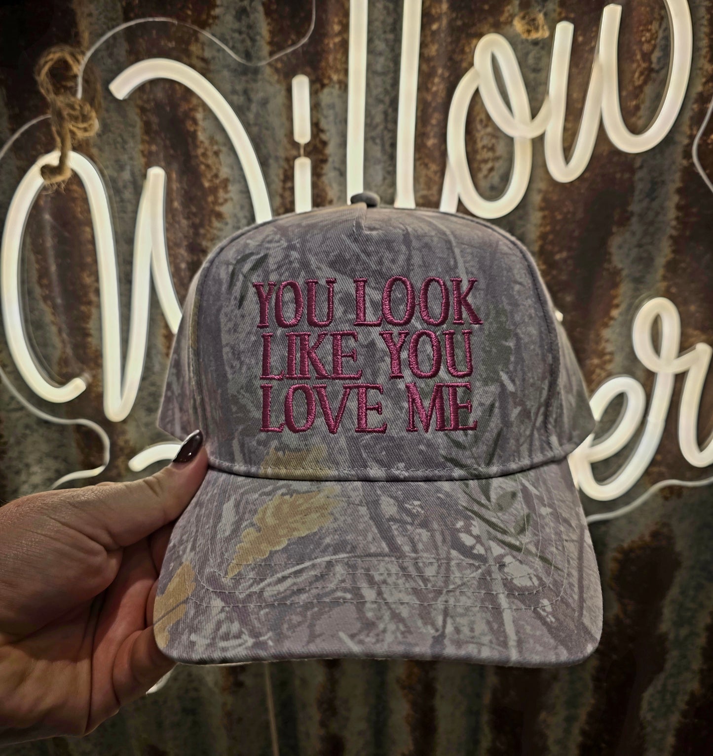 You look like you love me cap with pink embroidery on soft camo fabric