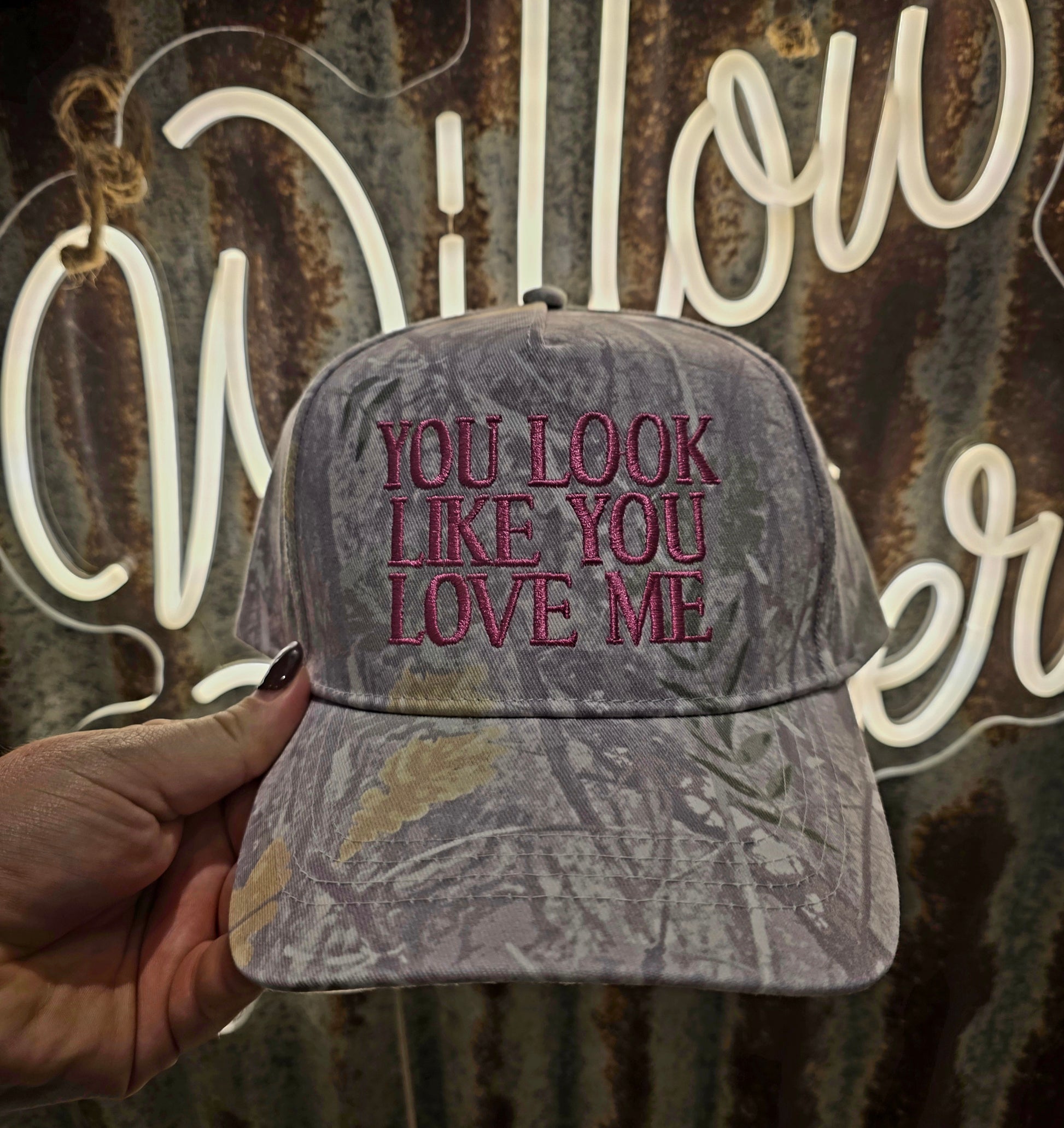 You look like you love me cap with pink embroidery on soft camo fabric