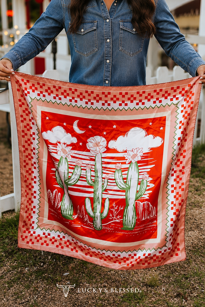Western silk wild rag featuring blooming cacti and desert sunset artwork